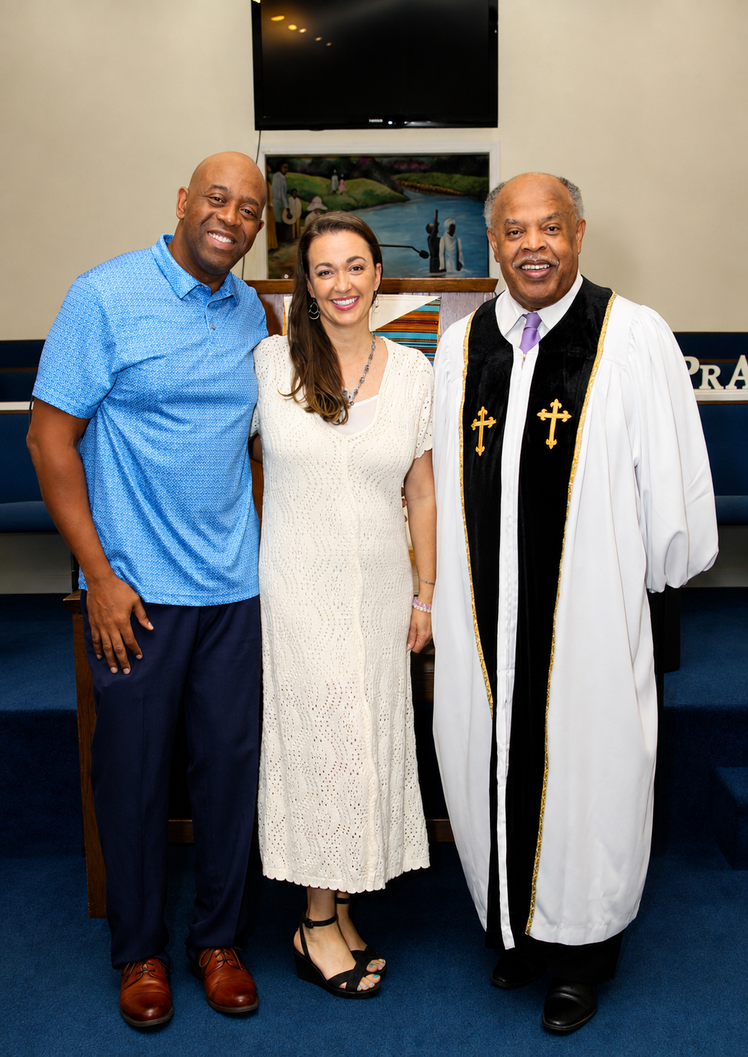 Reverend David Simmons sharing a photo opportunity with family